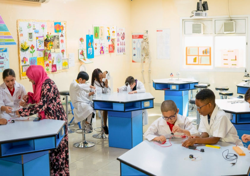 Students participating in a holistic learning activity at Apple International Community School, one of the top rated schools in Dubai.
